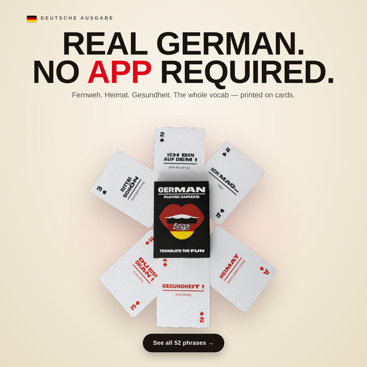 German Travel Tin – cards fanned around the box, each showing a German phrase with its English translation