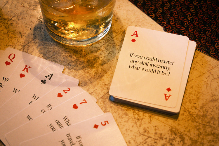 Ignite The Night Playing Cards – hand of conversation-starter cards on a table